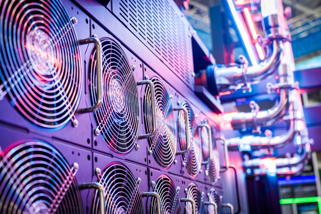 Close-up of server cooling fans in a data center, representing autonomous AI systems and cybersecurity risk.