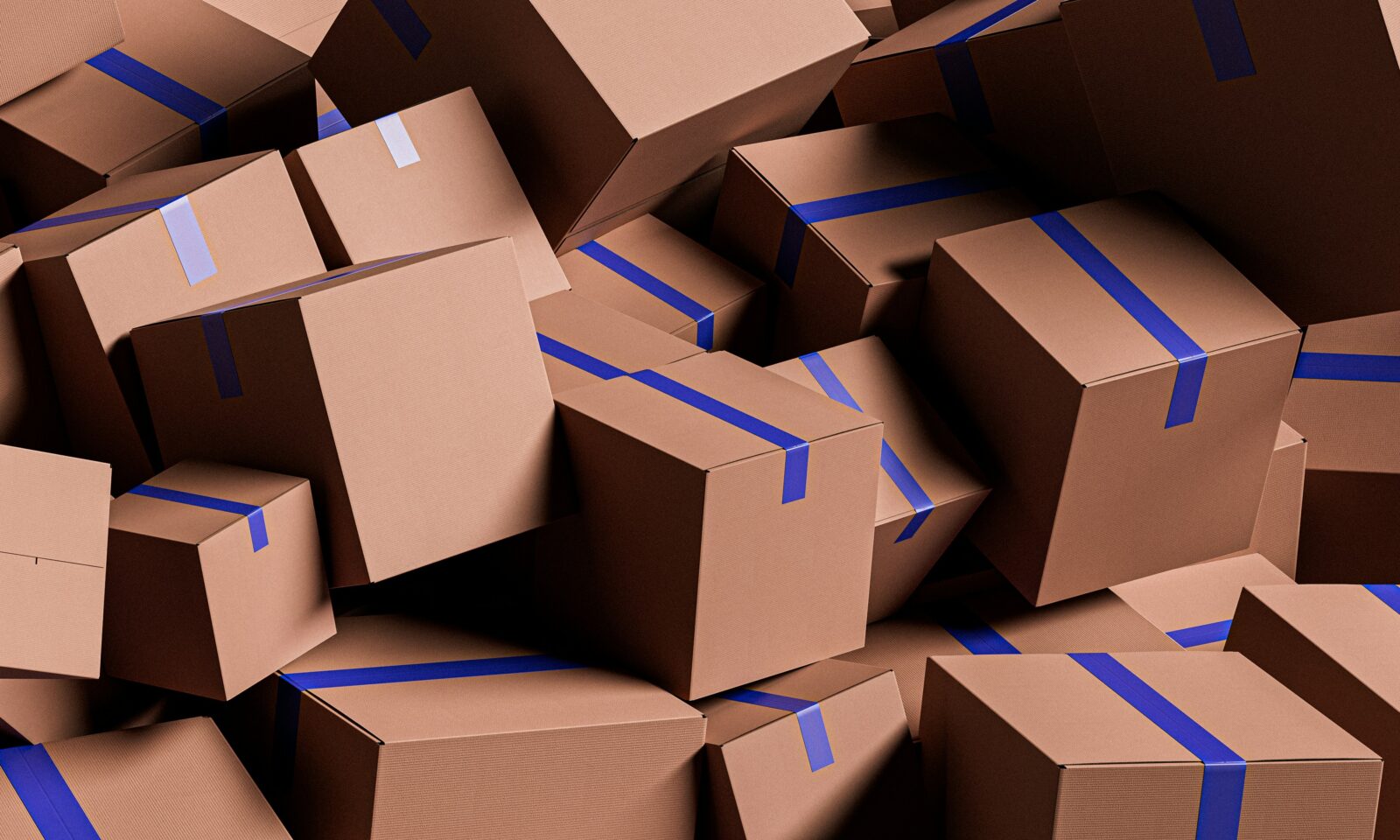 Large stack of cardboard shipping boxes in a warehouse