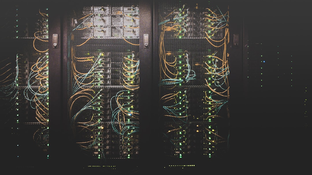 Rows of illuminated server racks inside a data center