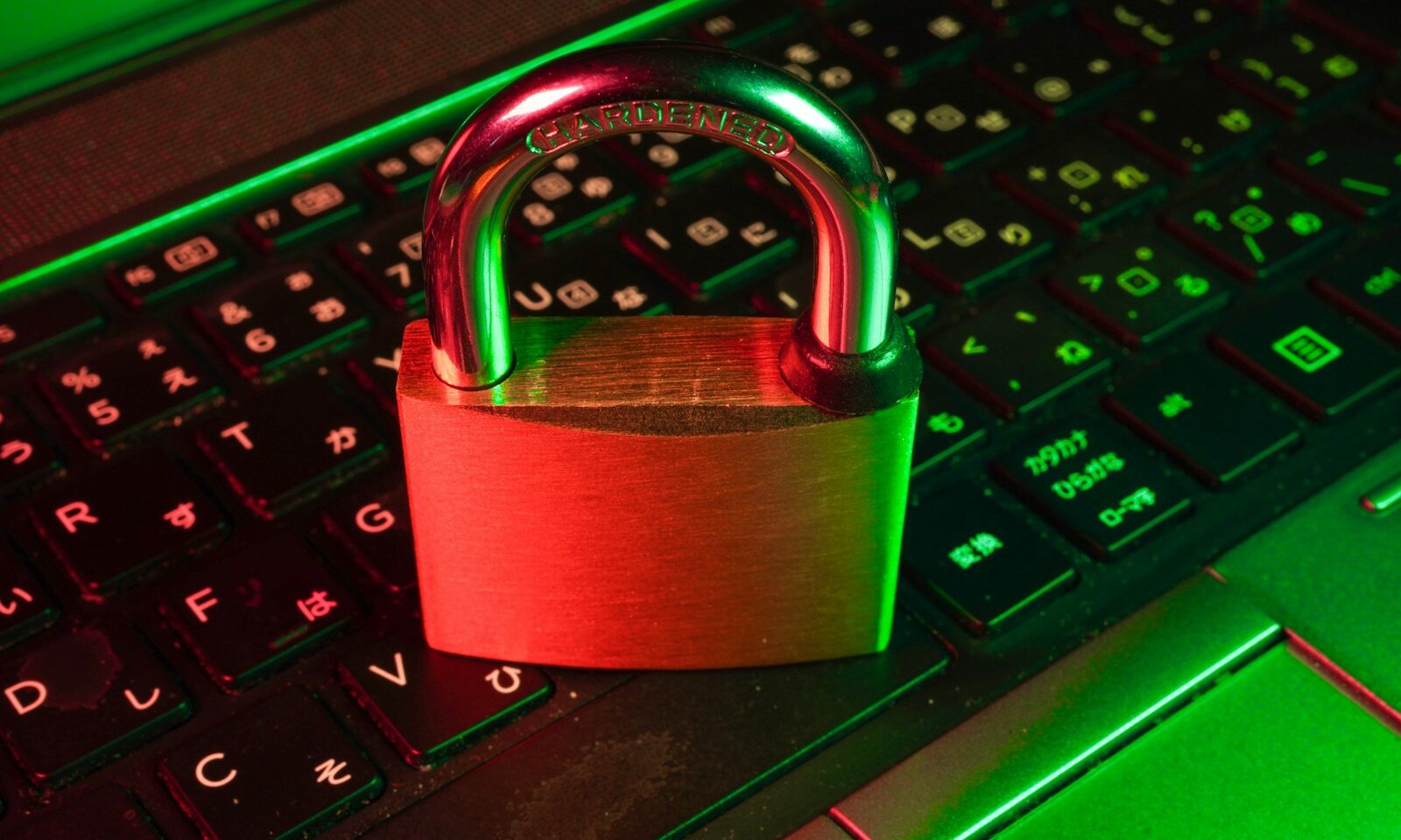 Glowing cybersecurity graphic on a laptop screen, illustrating AI content provenance and watermarking