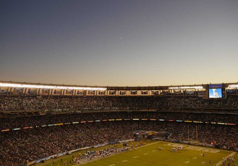 American football stadium viewed from the stands, illustrating the broadcast-style presentation of Madden NFL 27.
