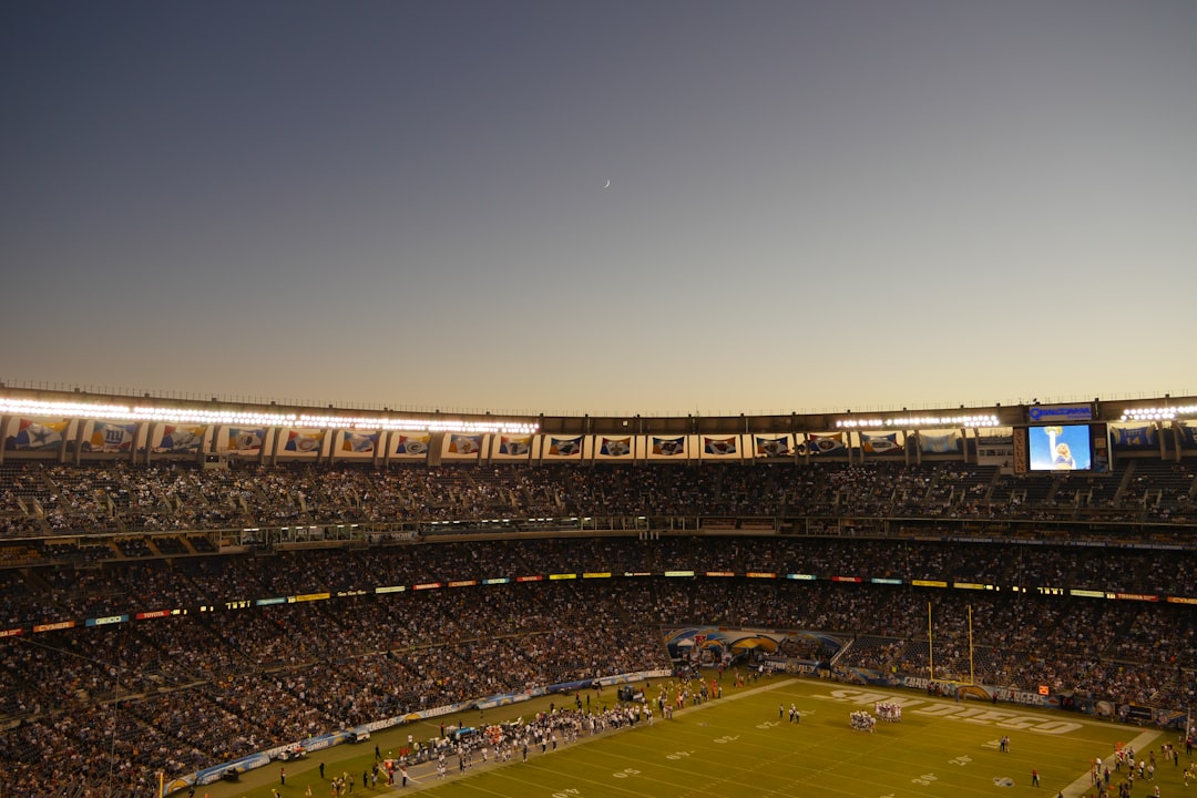 American football stadium viewed from the stands, illustrating the broadcast-style presentation of Madden NFL 27.