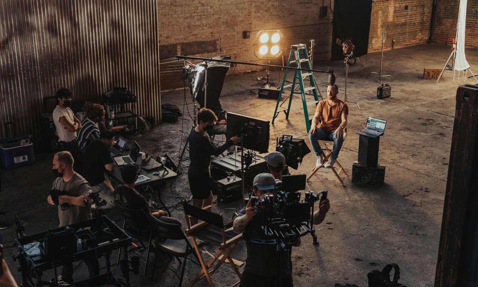 Production crew gathered around a camera, illustrating short-form filmmaking