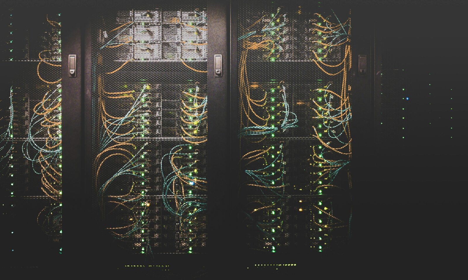 Blue network cables connected to server equipment in a data center
