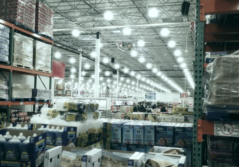 Wide aisle inside a brightly lit warehouse store