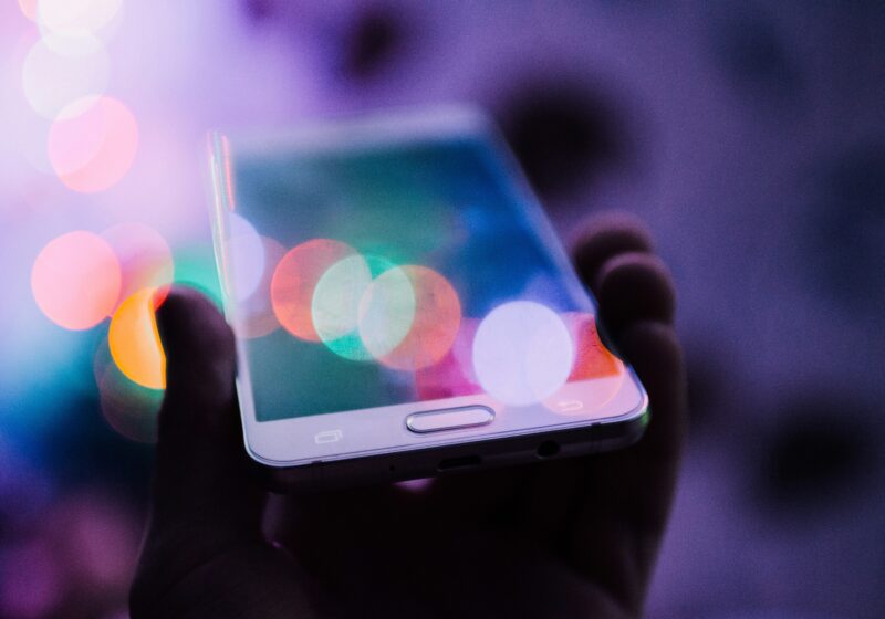 Person holding a smartphone, illustrative image for Google Pixel 11 AI features