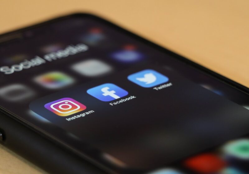 Smartphone on a table, illustrating social media settings