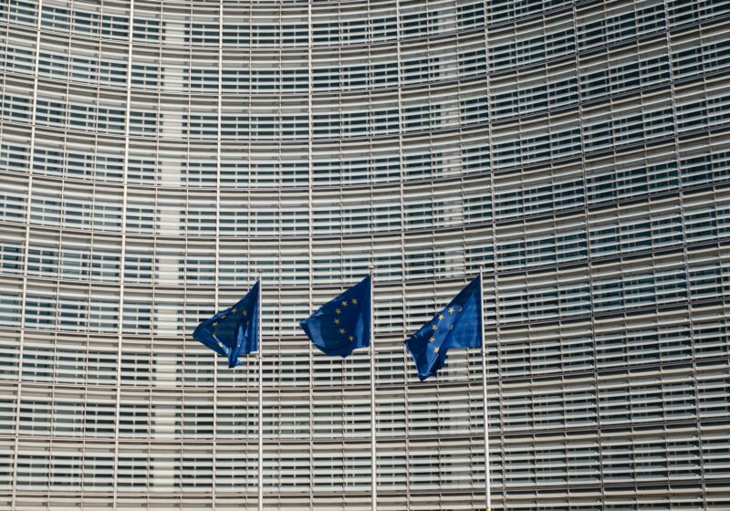European Union flags outside the European Commission building in Brussels