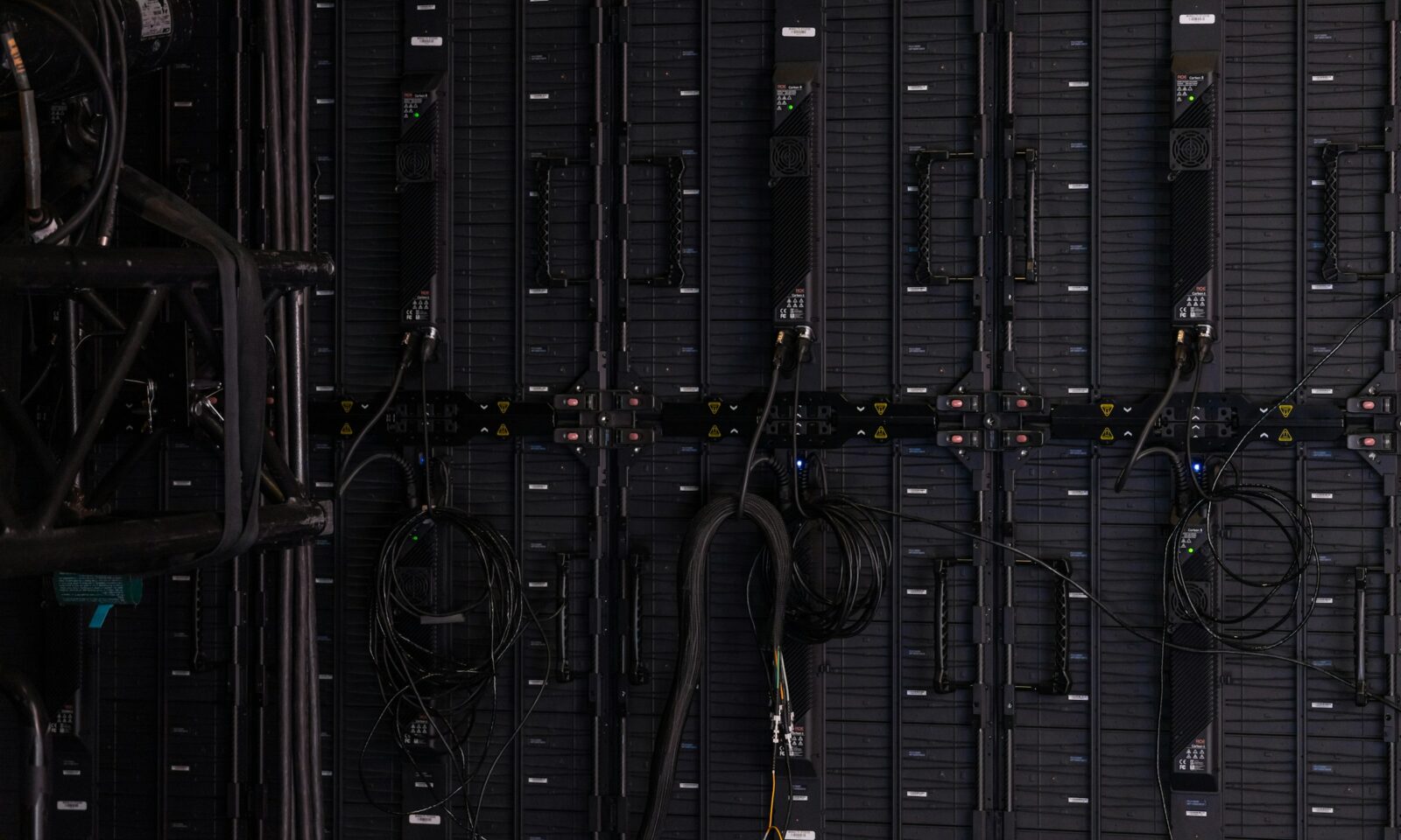 Close-up of network cables and switches in a server room