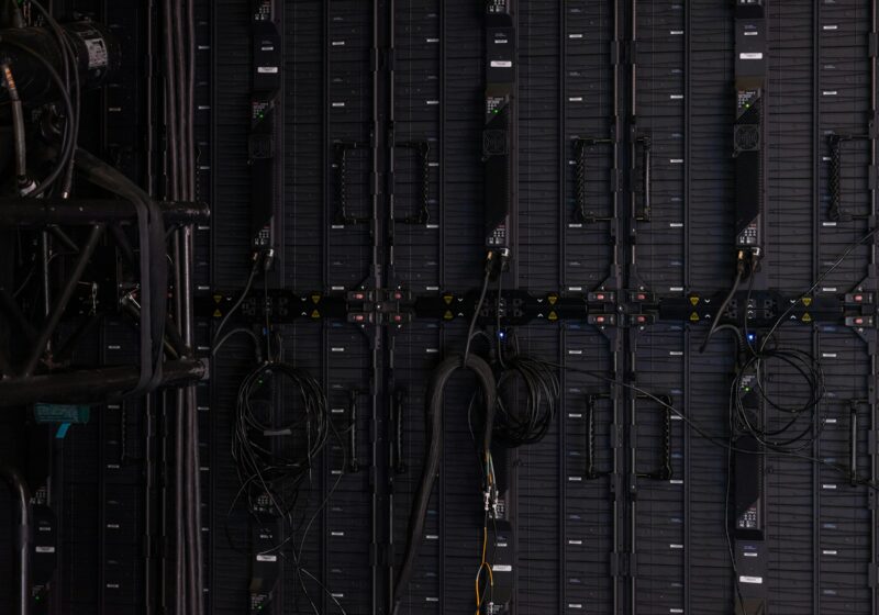 Close-up of network cables and switches in a server room