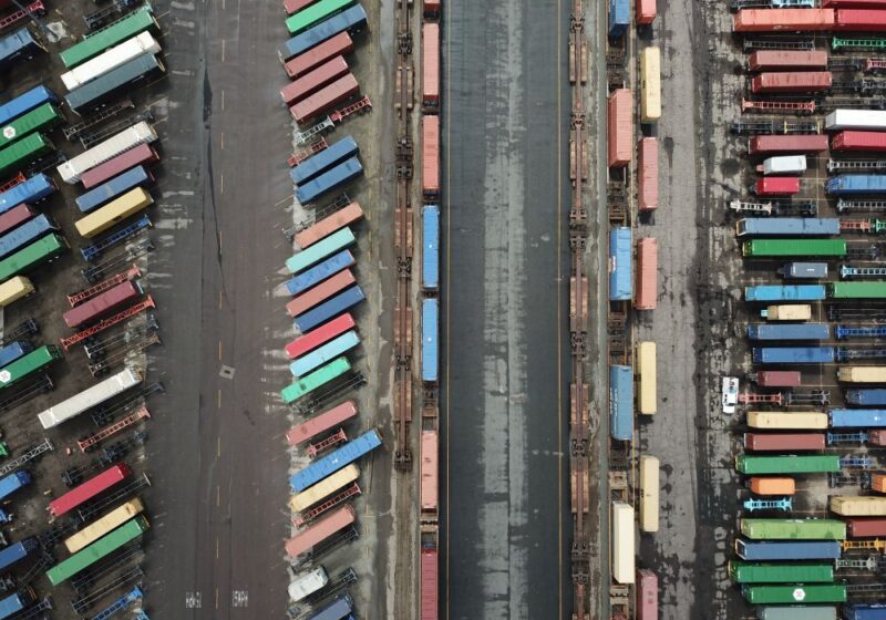 Aerial view of colorful shipping containers at a port terminal