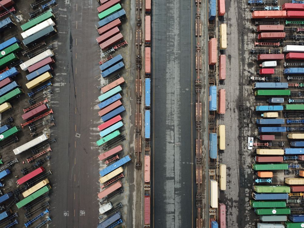 Aerial view of colorful shipping containers at a port terminal