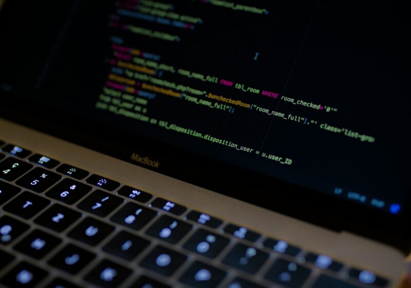 Lines of computer code displayed on a laptop screen