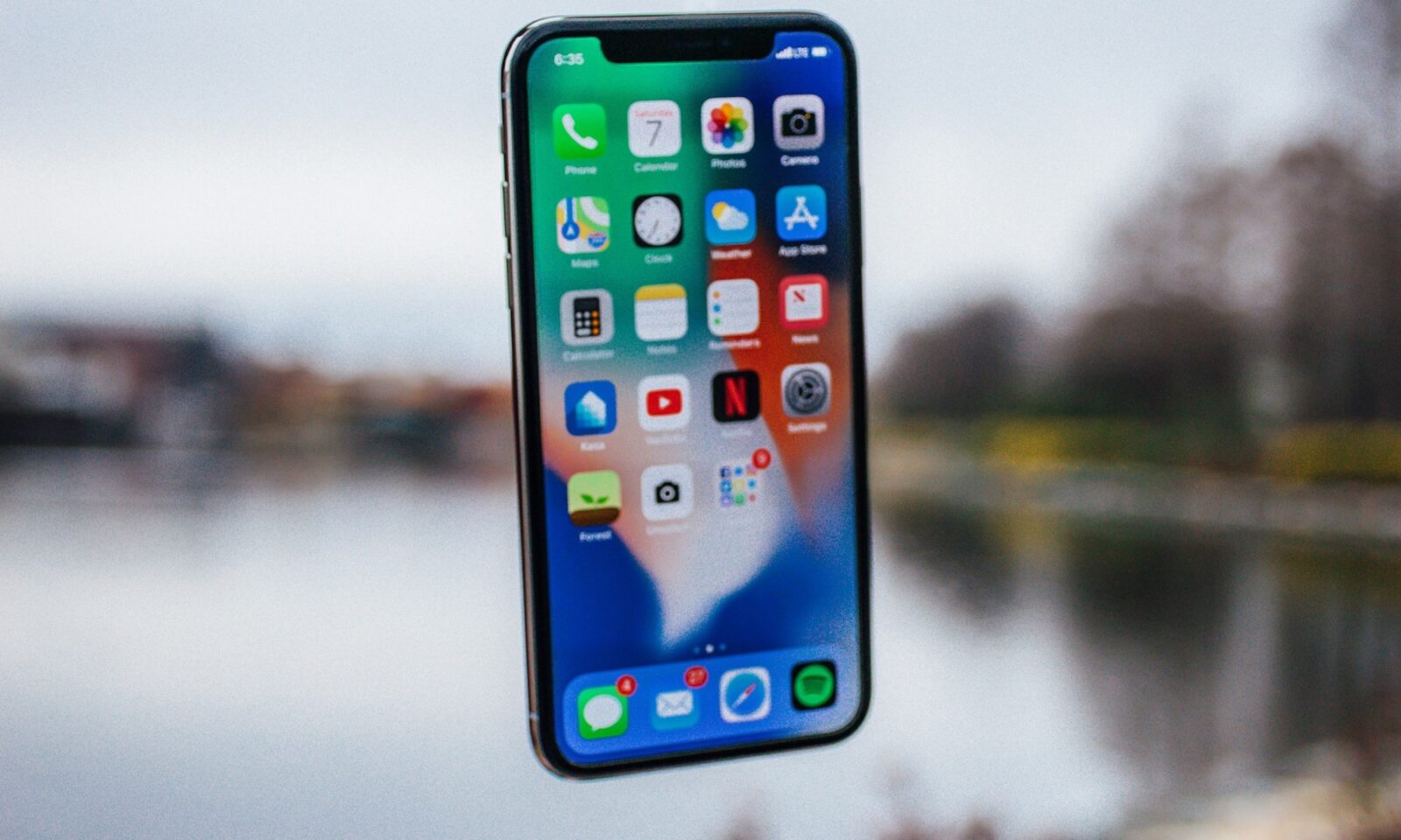 Apple iPhone standing upright, illustrating smartphone camera authenticity tools