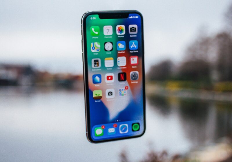 Apple iPhone standing upright, illustrating smartphone camera authenticity tools