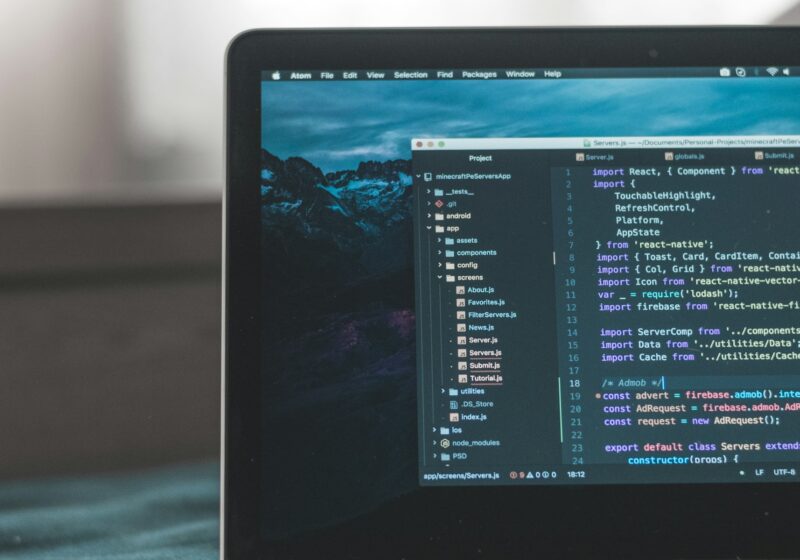 Source code displayed on a laptop screen