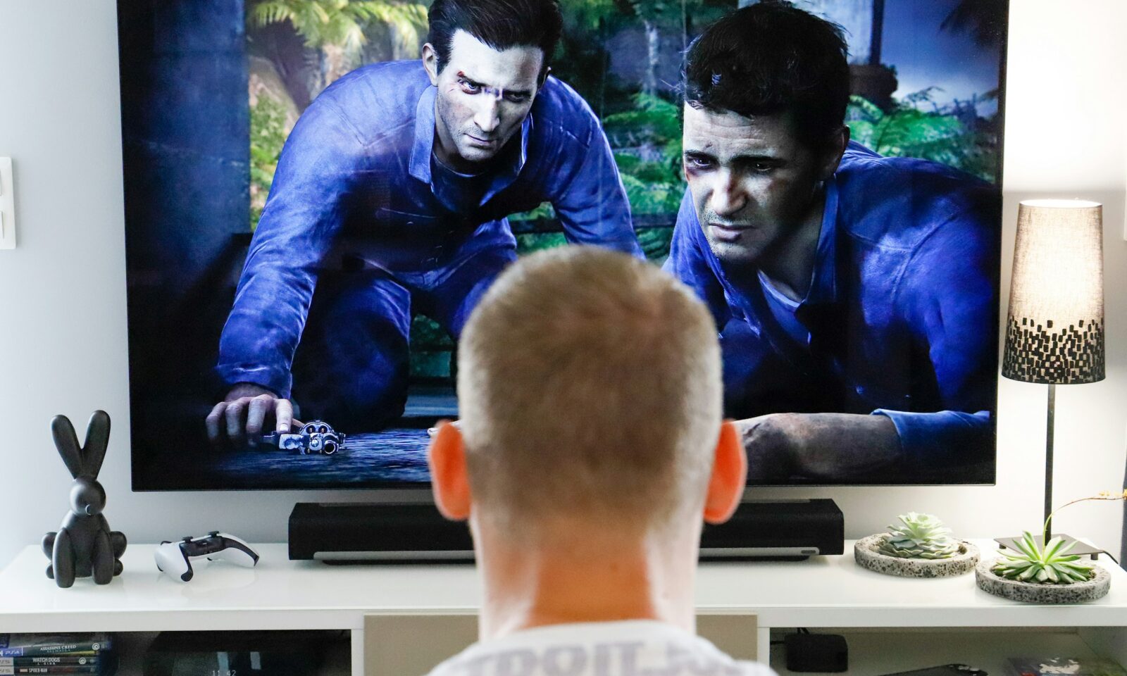 Viewer watching a movie on a living-room television