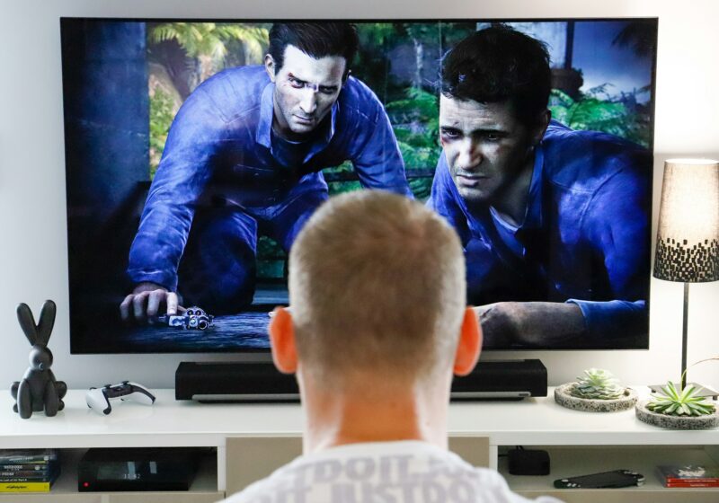Viewer watching a movie on a living-room television