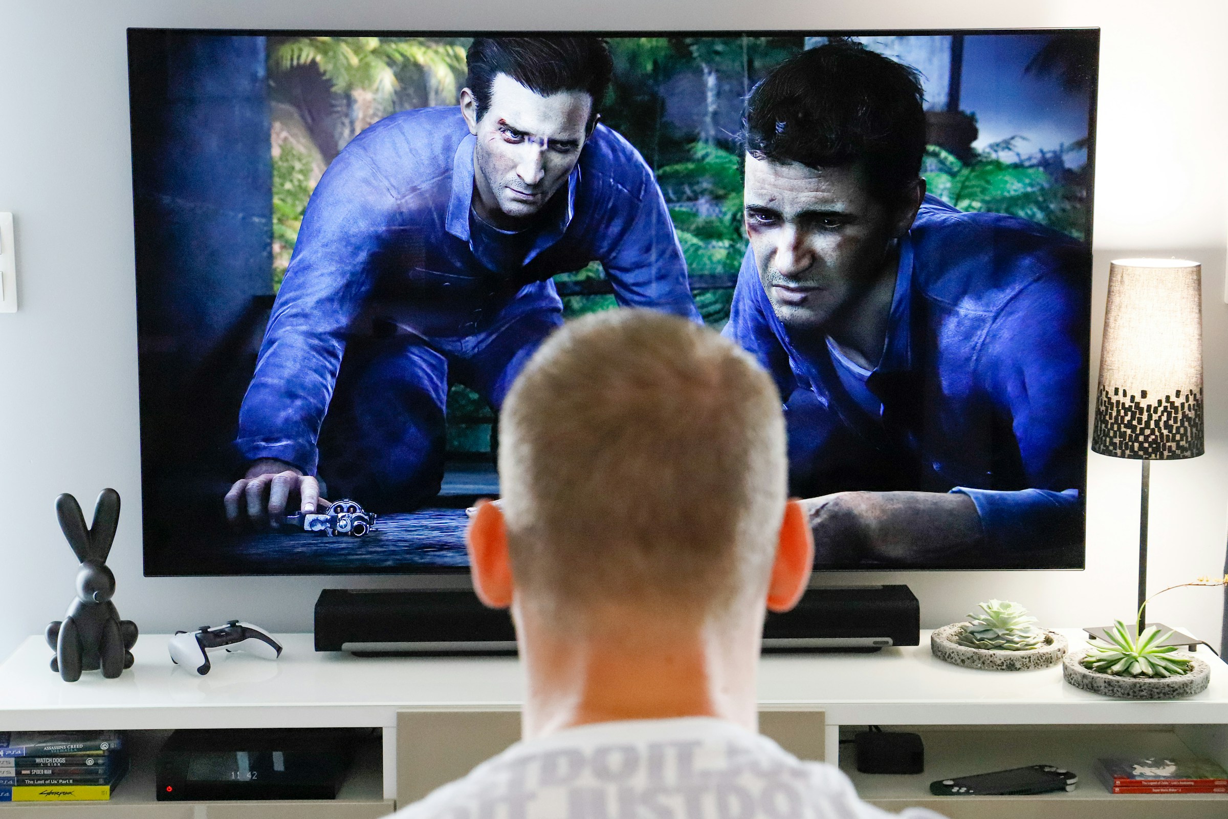 Viewer watching a movie on a living-room television