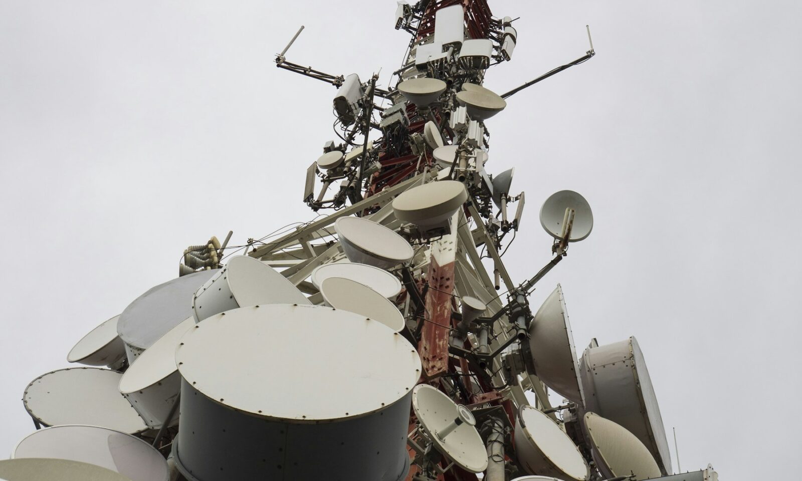 Telecommunications tower with multiple antennas illustrating network infrastructure