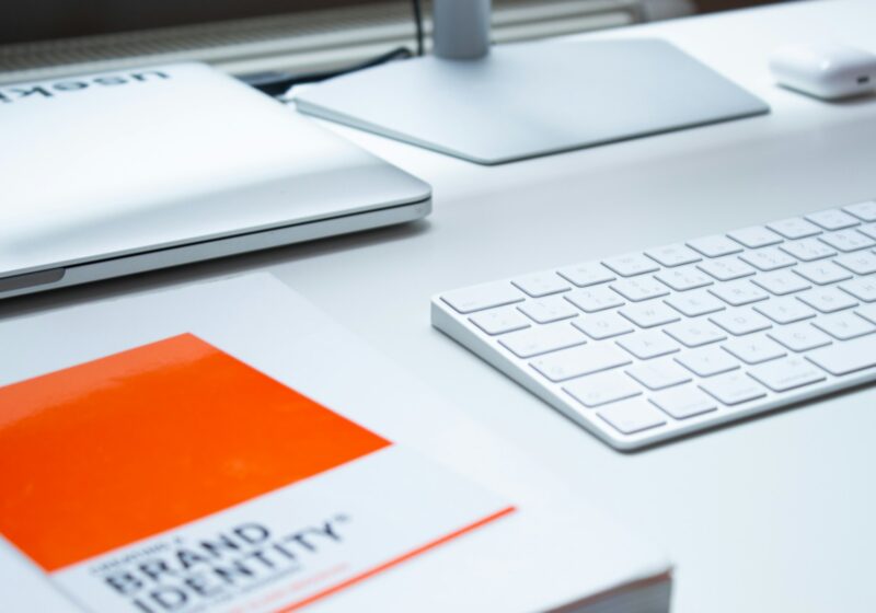 Laptop and keyboard on a clean desk, illustrating desktop AI workflows