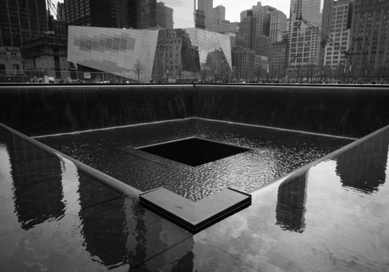Black-and-white view of the 9/11 Memorial South Pool in New York