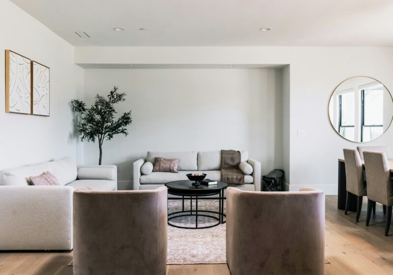 Modern living room with neutral furniture and wall art