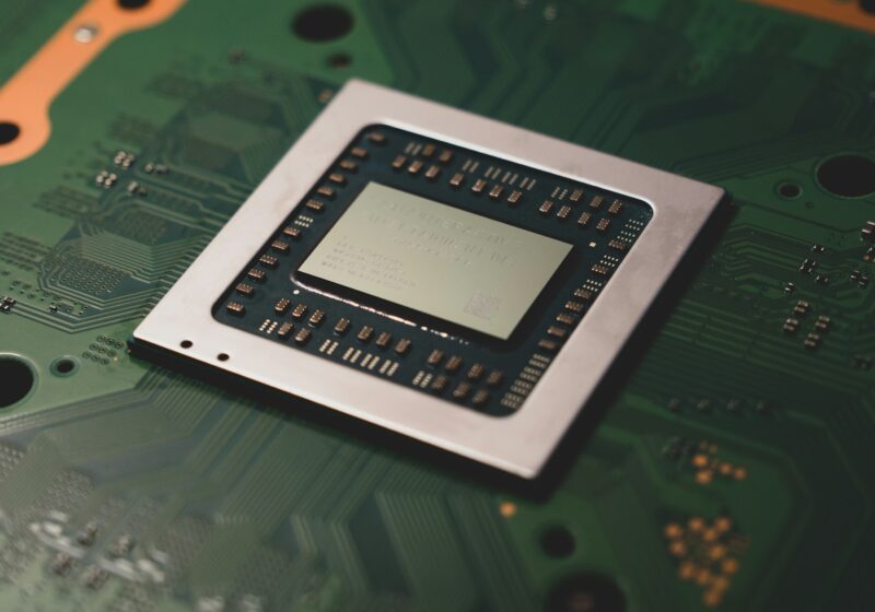 Close-up of a computer processor on a circuit board, illustrating local AI computing