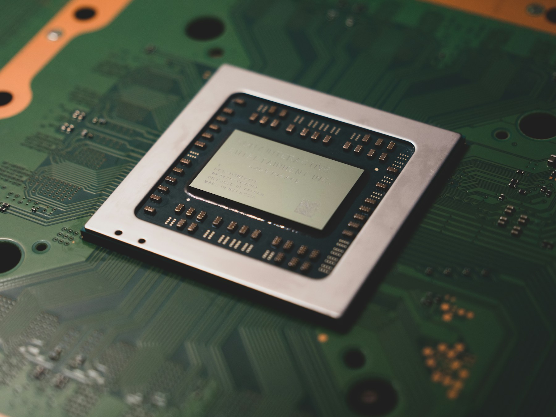 Close-up of a computer processor on a circuit board, illustrating local AI computing