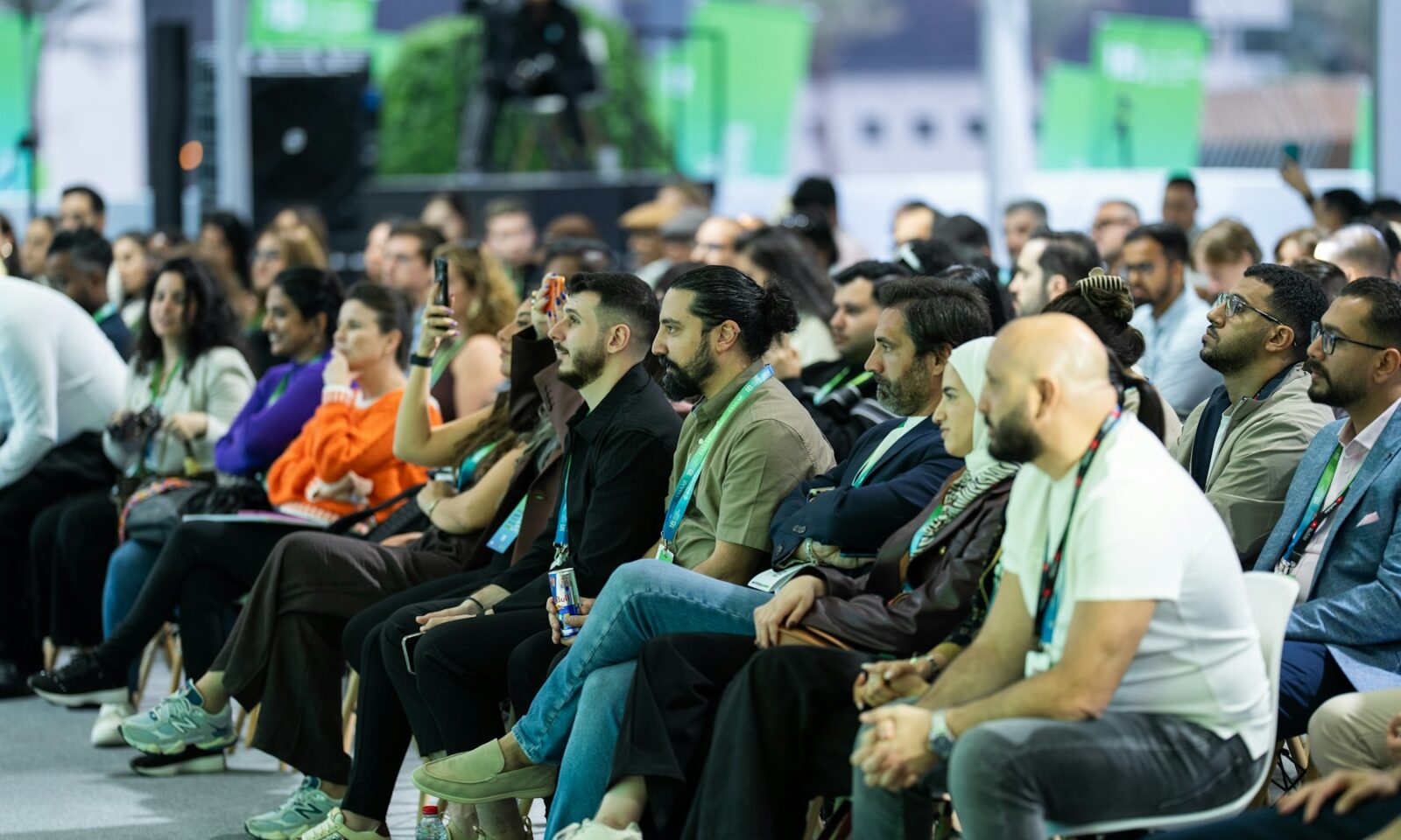 Conference audience listening to a business presentation