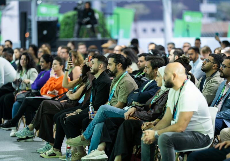 Conference audience listening to a business presentation