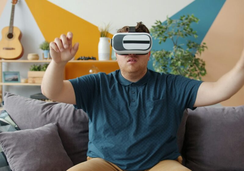 Person wearing a virtual-reality headset, illustrating augmented-reality computing