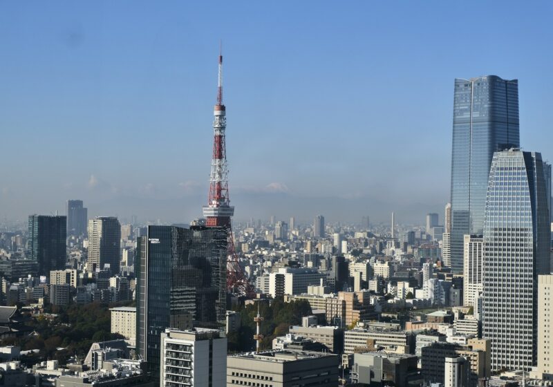 Tokyo Tower and Tokyo skyline with Mount Fuji visible in the distance
